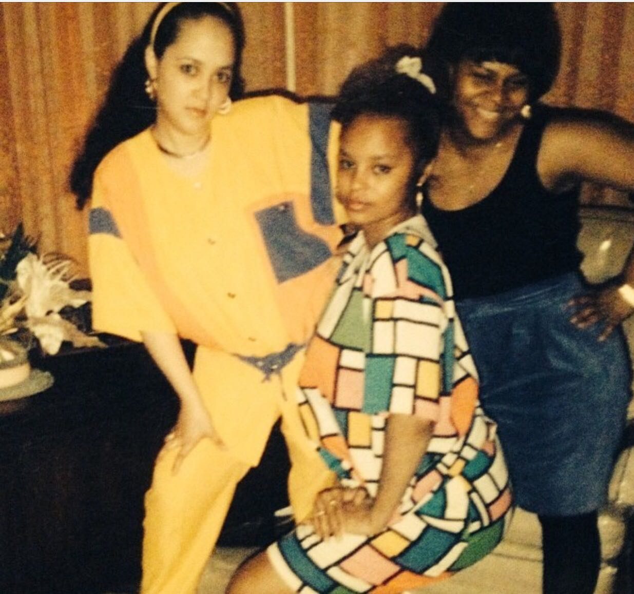 Sonya with two friends, posing in bold colors