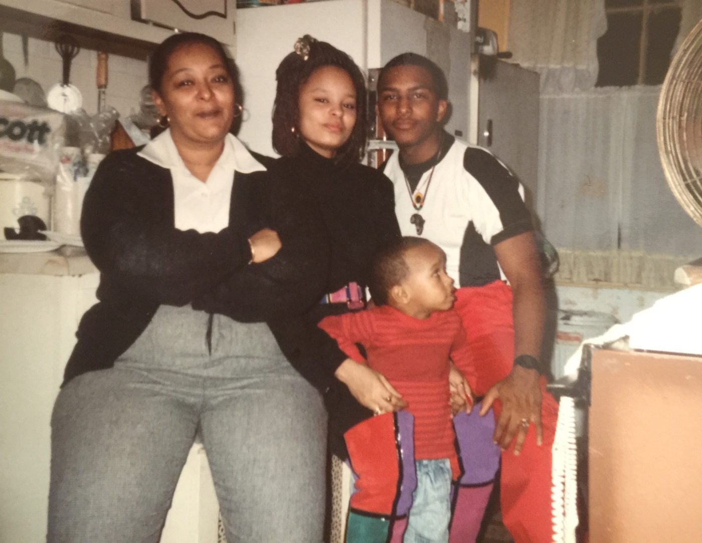 Sonya with family in the kitchen