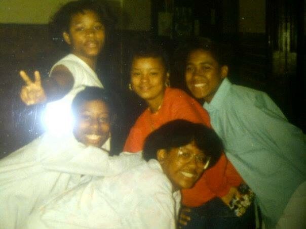 Sonya smiling with a group of friends
